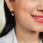 گوشواره نقره دوکاره حلقه و مروارید ساخته شده از نقره با عیار 925 خالص با روکش طلا سفید
