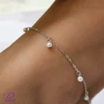 پابند نقره نگین دار ساخته شده از نقره با عیار 925 با روکش طلا سفید
